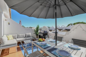 Duplex apartment with BBQ and resort amenities